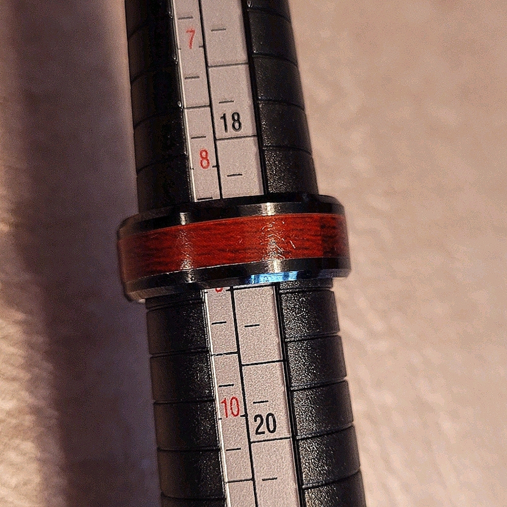 Black ring w/wood inlay.